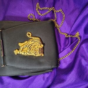 Elegant Black Bag with Gold Tiger Accent